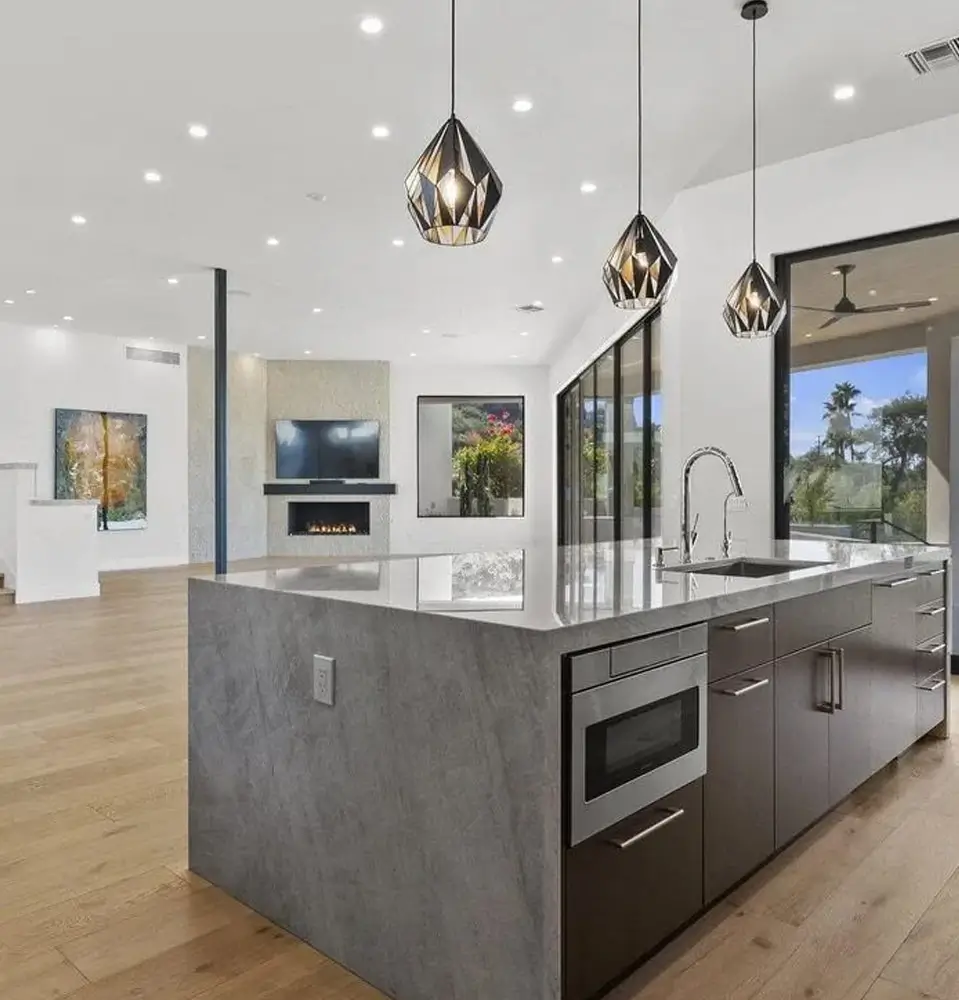 Bernier cabinetry in a contemporary Scottsdale kitchen with a dark island